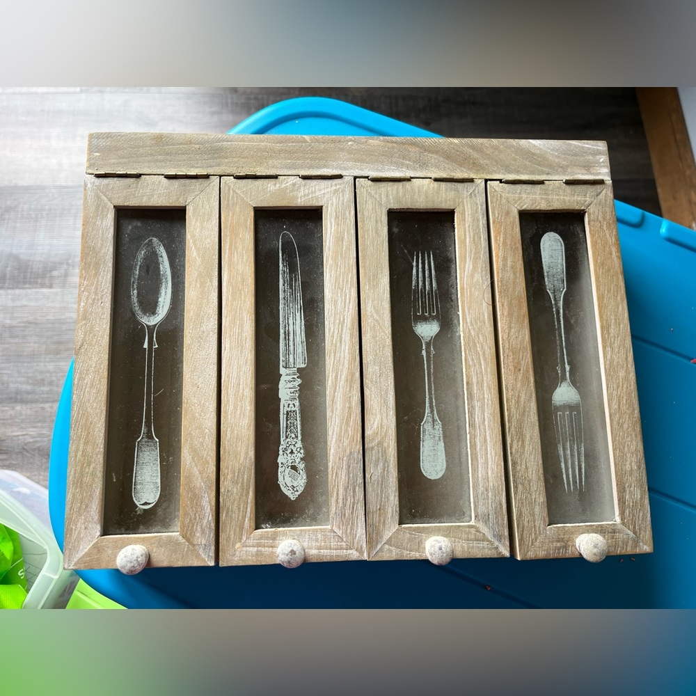 Wooden and glass silverware holder/organizer.